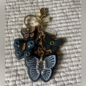 Coach butterfly purse charm